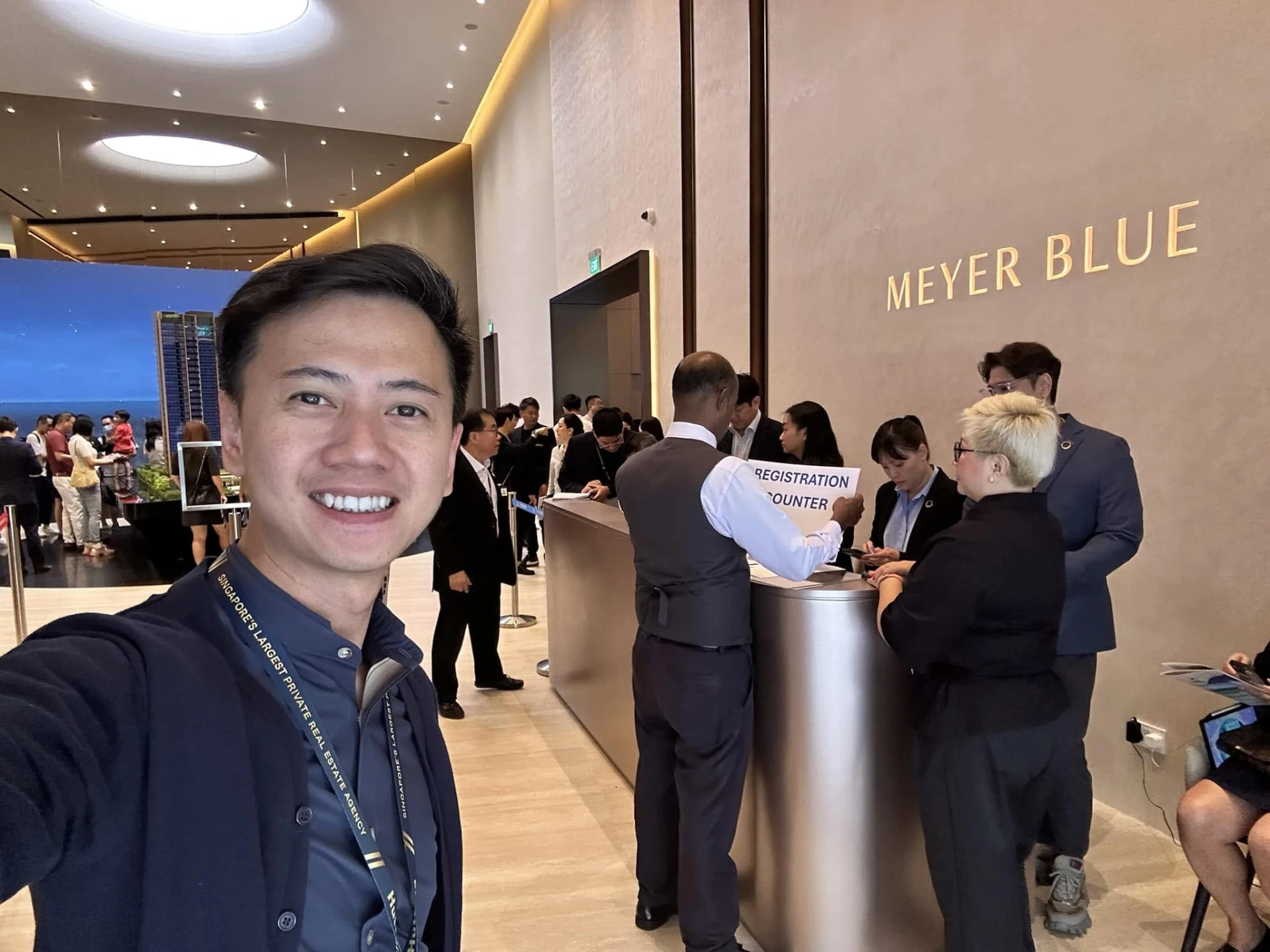Fendy at the Meyer Blue sales gallery registration counter on launch day