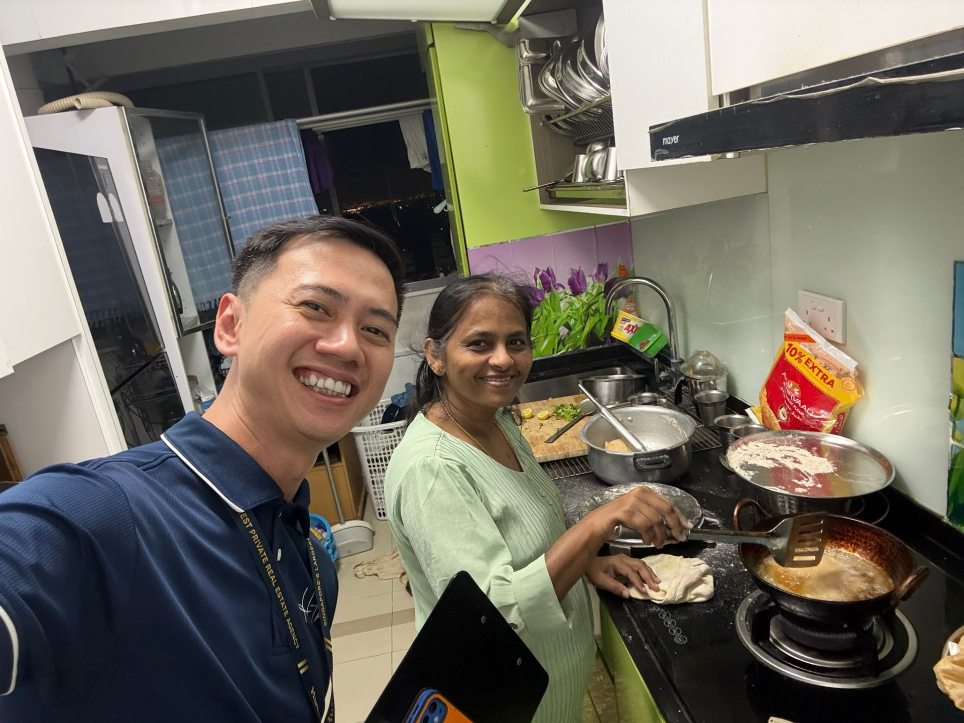 Fendy with a client in her kitchen during a home visit