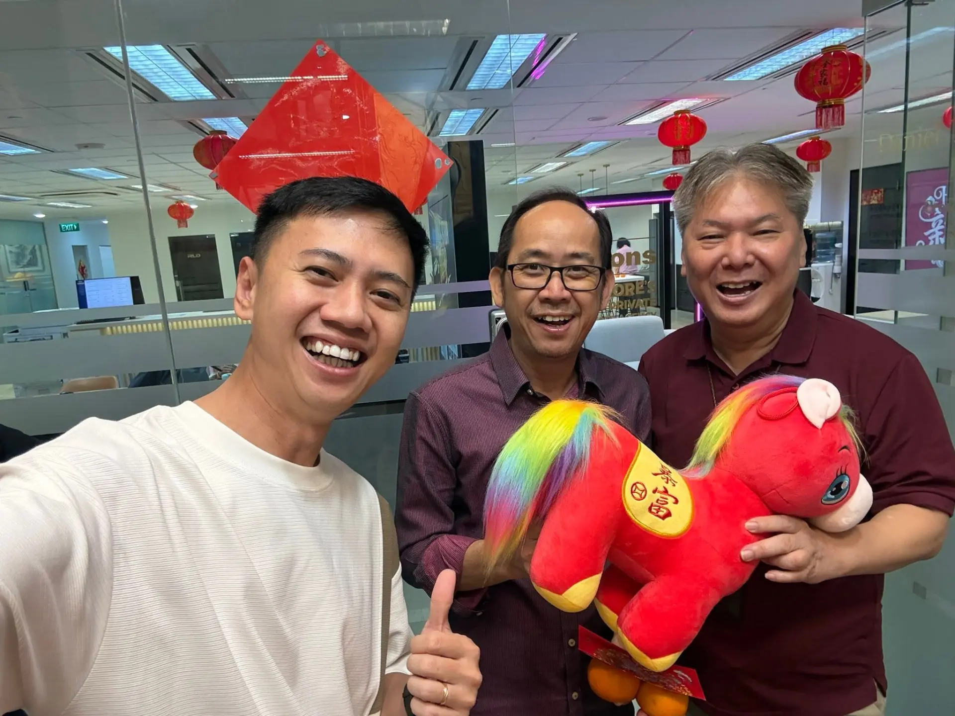 Fendy Lee celebrating Chinese New Year with colleagues in the office
